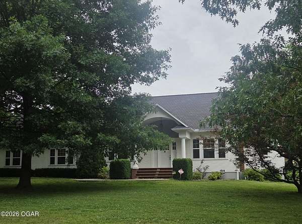 4.86 Acres of Land with Home for Sale in Carthage, Missouri