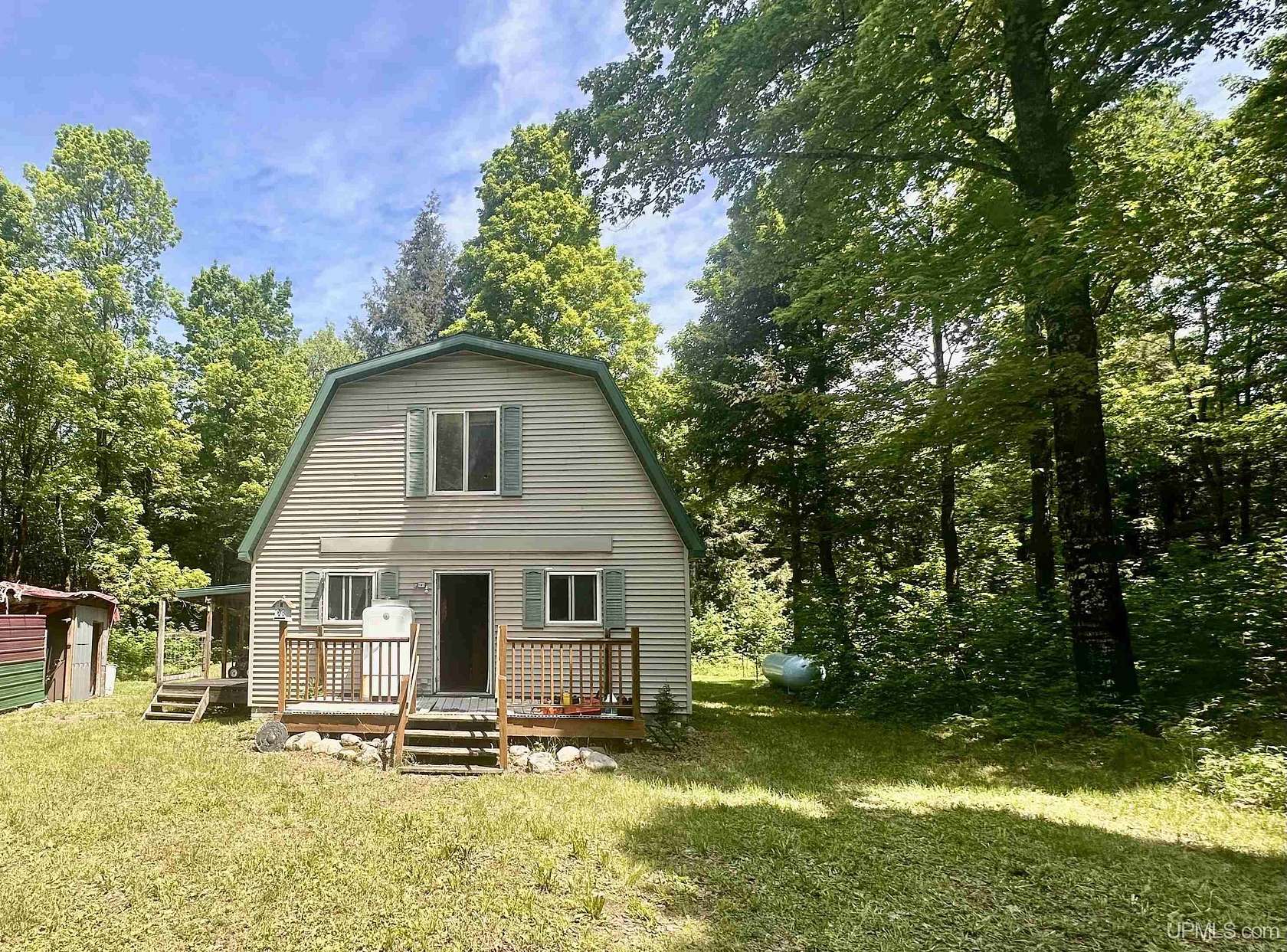 59.4 Acres of Recreational Land with Home for Sale in Big Bay, Michigan