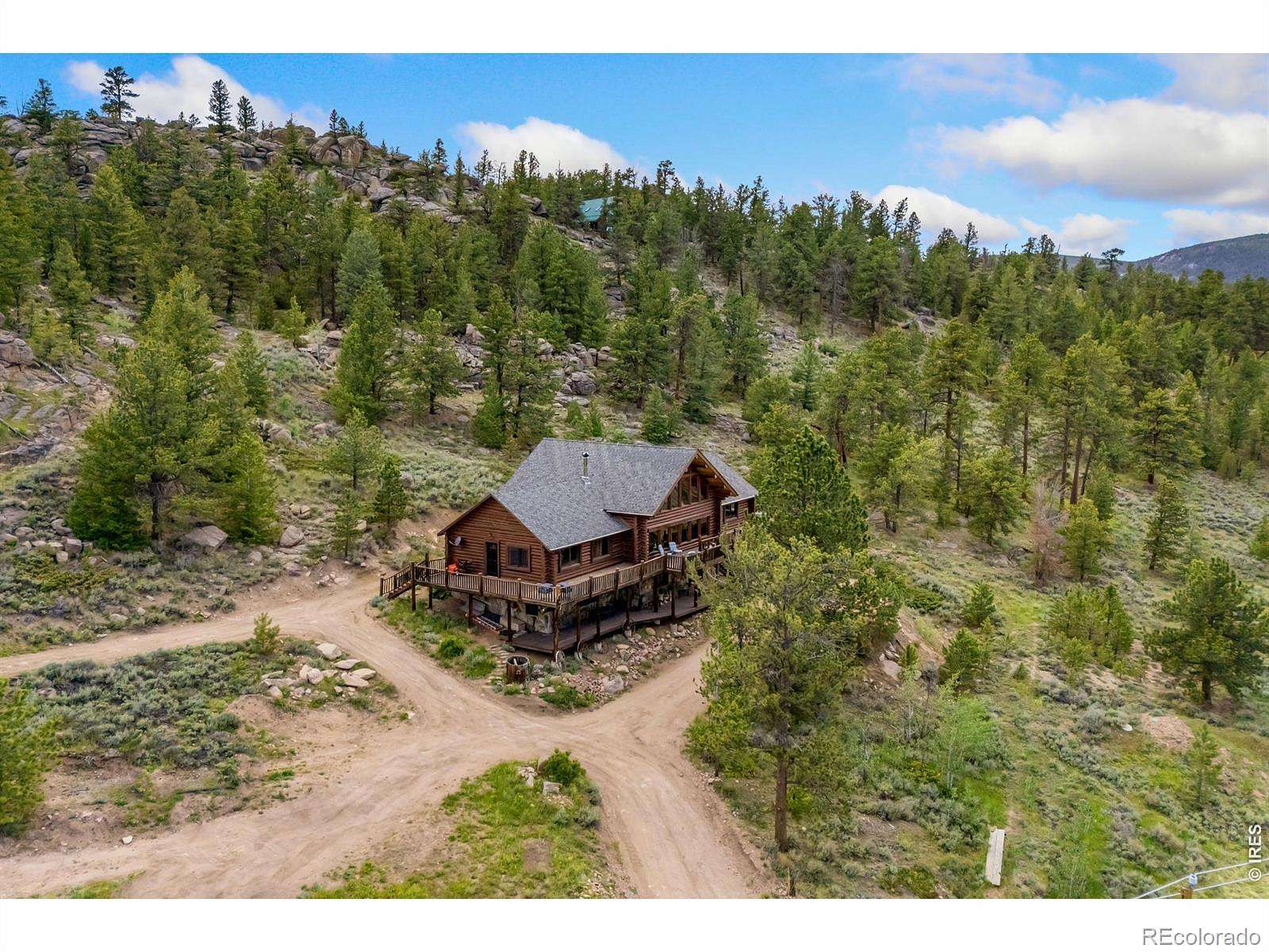 4 Acres of Land with Home for Sale in Red Feather Lakes, Colorado