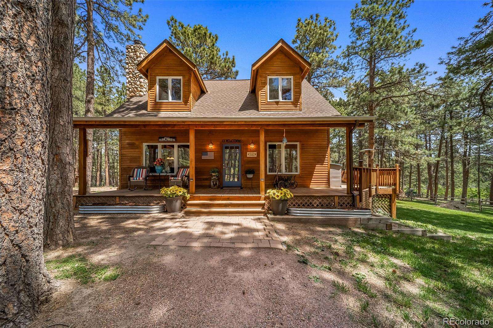 5 Acres of Land with Home for Sale in Larkspur, Colorado