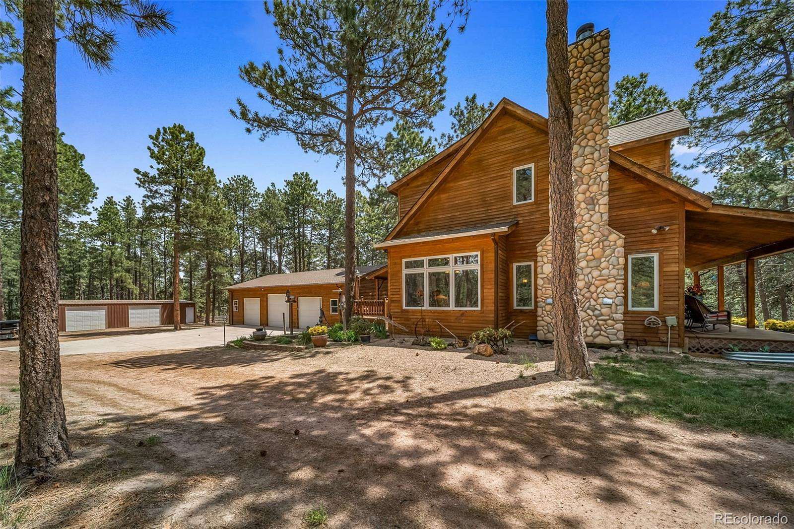 5 Acres of Land with Home for Sale in Larkspur, Colorado