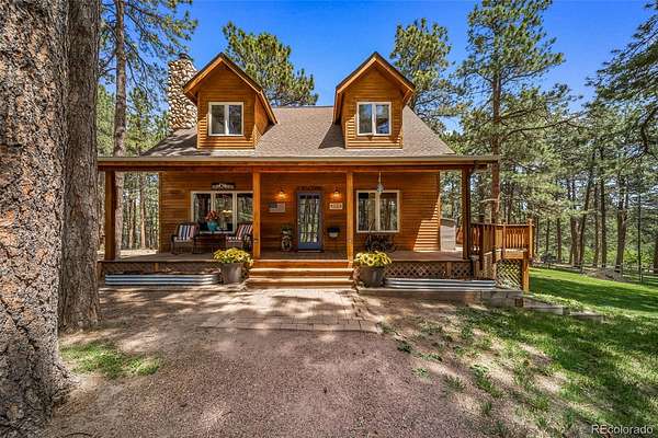 5 Acres of Land with Home for Sale in Larkspur, Colorado
