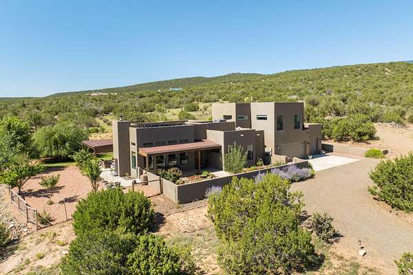 10.2 Acres of Land with Home for Sale in Sandia Park, New Mexico