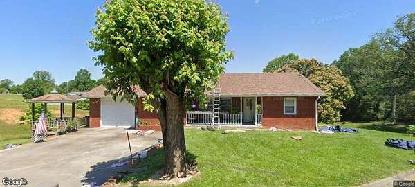 6.5 Acres of Land with Home for Auction in Greensburg, Kentucky