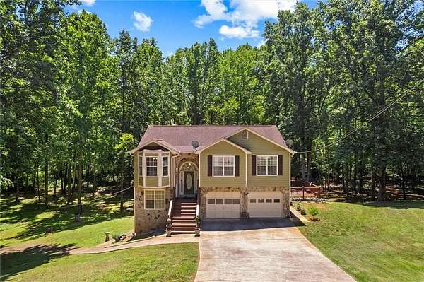 4.22 Acres of Land with Home for Sale in Flowery Branch, Georgia