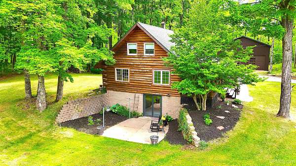 15 Acres of Land with Home for Sale in Skandia, Michigan