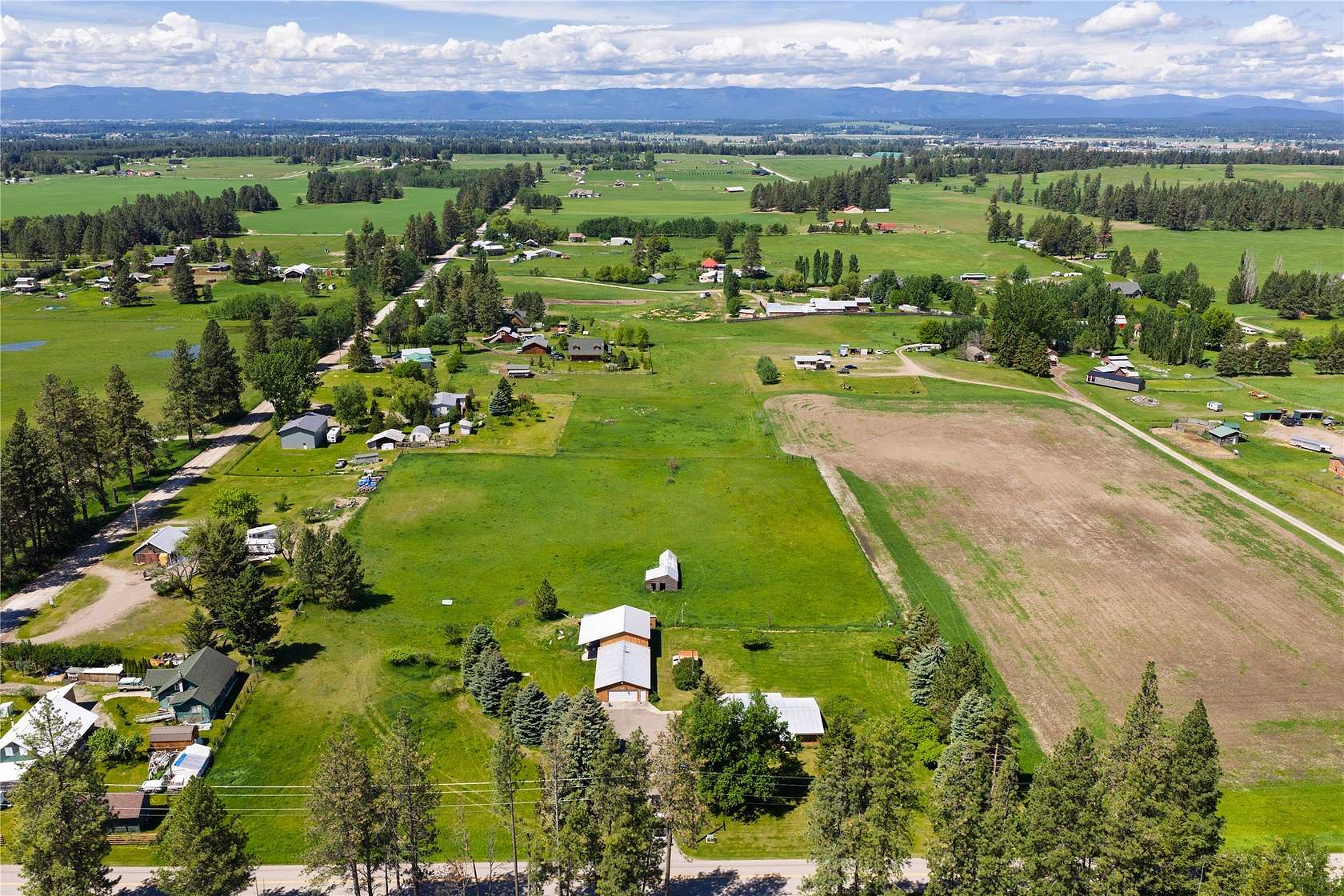 5.27 Acres of Land with Home for Sale in Columbia Falls, Montana