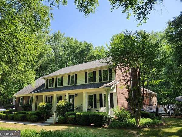 3.69 Acres of Land with Home for Sale in Lawrenceville, Georgia