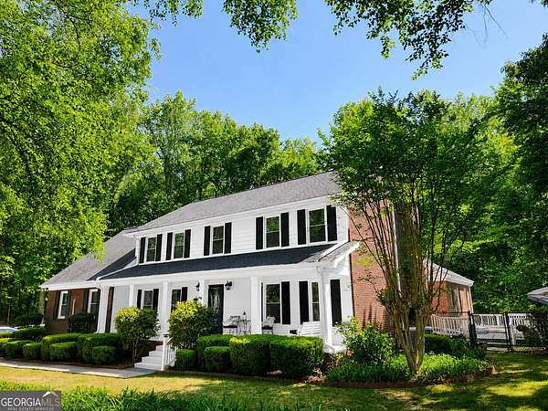 3.69 Acres of Land with Home for Sale in Lawrenceville, Georgia