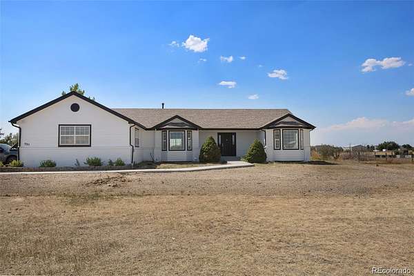 2.43 Acres of Land with Home for Sale in Strasburg, Colorado