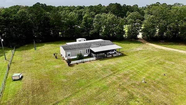 13.6 Acres of Land with Home for Sale in Slocomb, Alabama