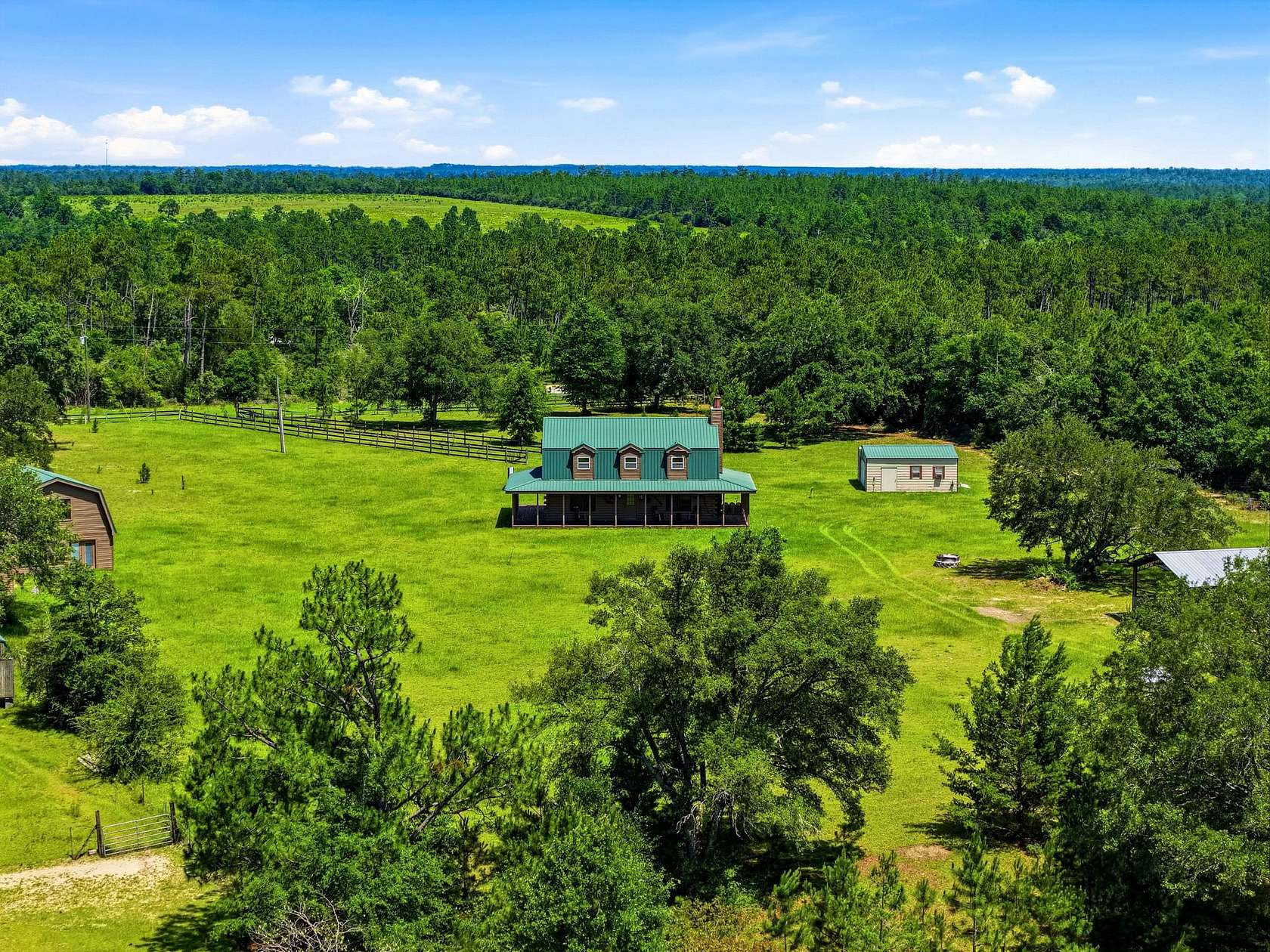 170 Acres of Land with Home for Sale in Alford, Florida
