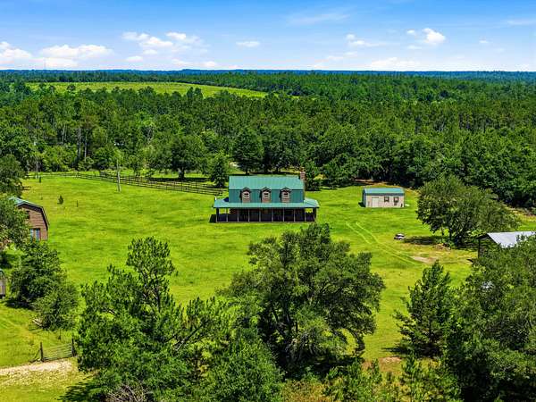 170 Acres of Land with Home for Sale in Alford, Florida