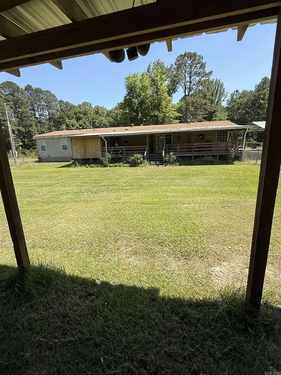7.52 Acres of Land with Home for Sale in Louann, Arkansas
