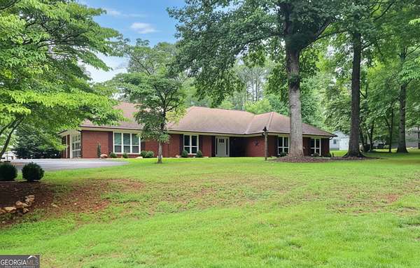 2.84 Acres of Land with Home for Sale in Canton, Georgia