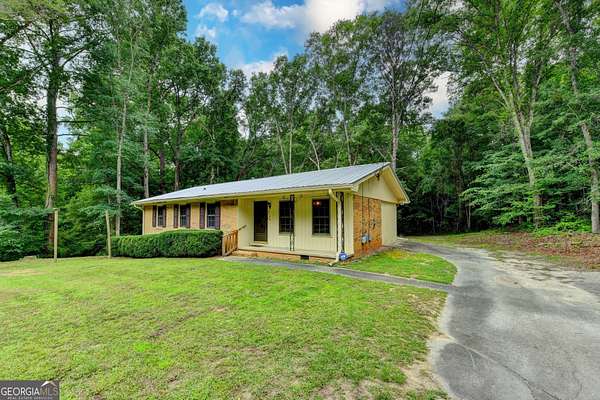 1.77 Acres of Land with Home for Sale in Conyers, Georgia