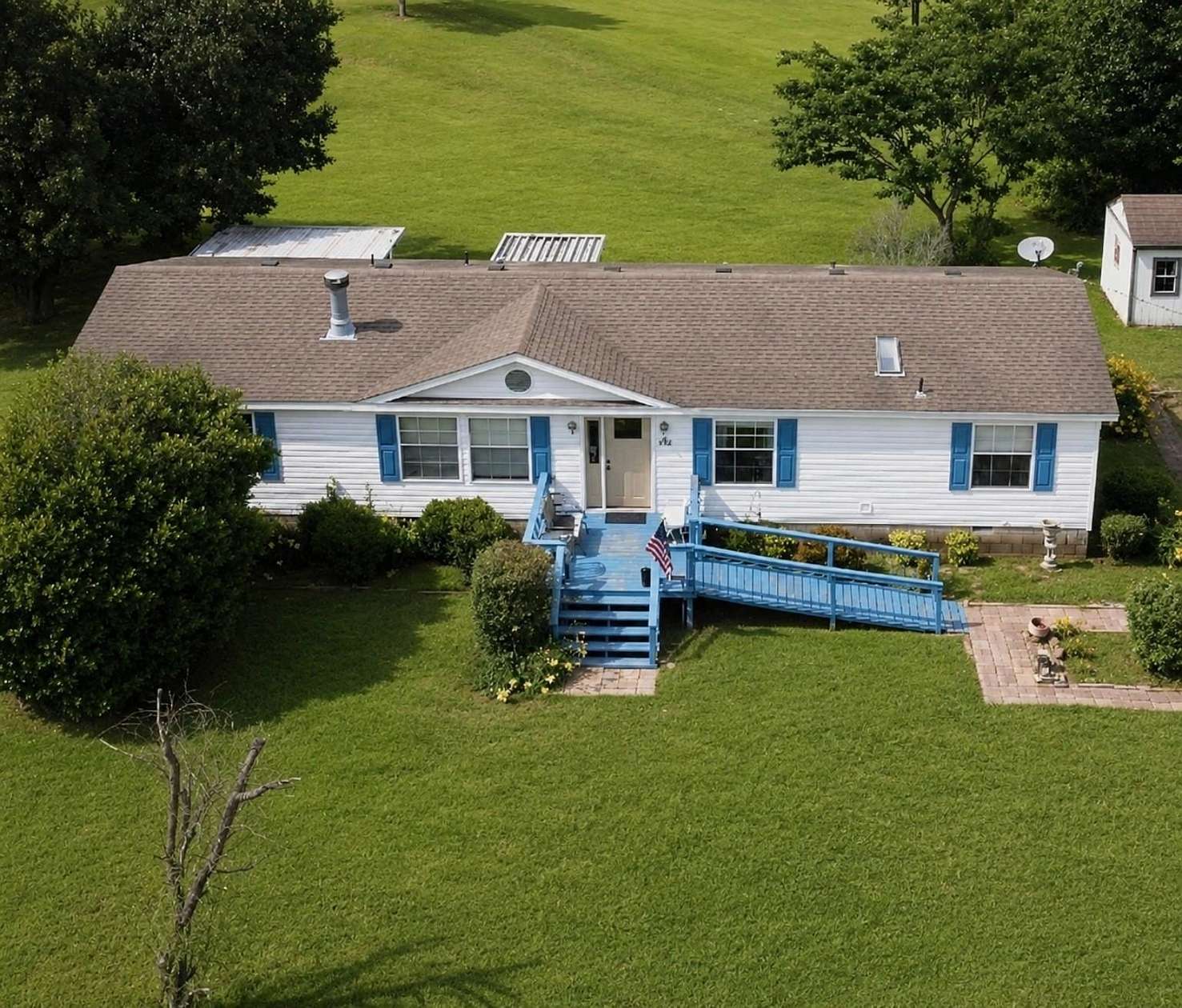 5 Acres of Land with Home for Sale in Mason, Tennessee