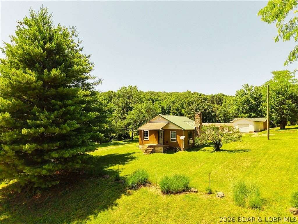 5 Acres of Land with Home for Sale in Gravois Mills, Missouri