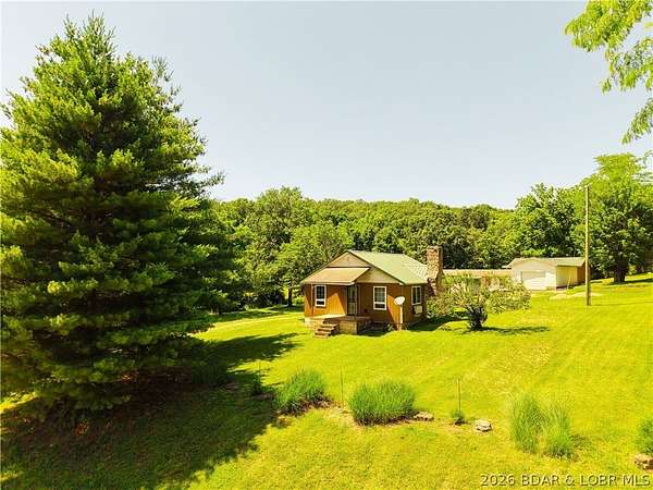 5 Acres of Land with Home for Sale in Gravois Mills, Missouri