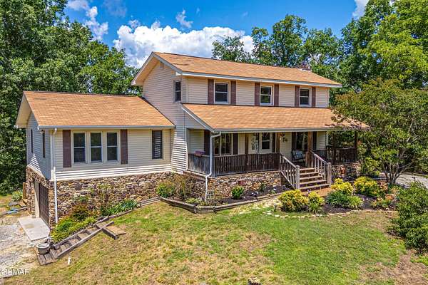 5.2 Acres of Land with Home for Sale in Sevierville, Tennessee