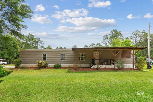 24.2 Acres of Land with Home for Sale in Robertsdale, Alabama