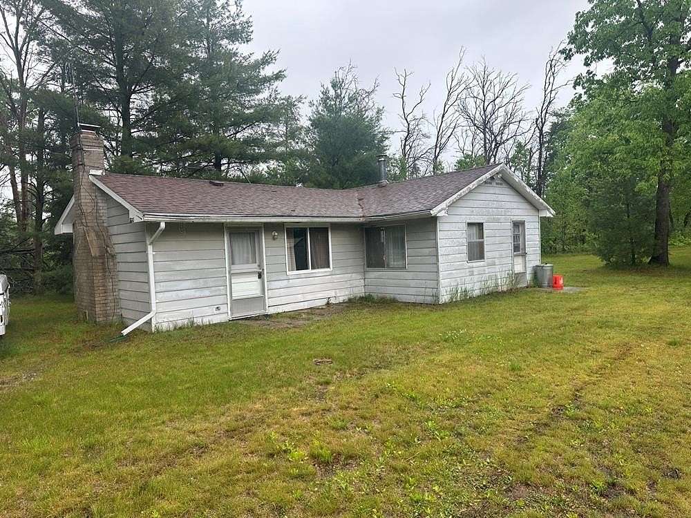 2.5 Acres of Land with Home for Sale in Harrison, Michigan