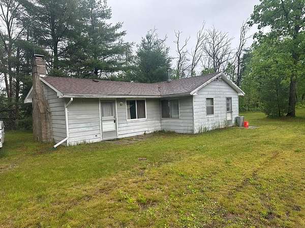 2.5 Acres of Land with Home for Sale in Harrison, Michigan