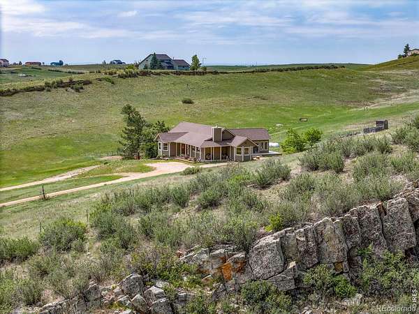 13 Acres of Land with Home for Sale in Berthoud, Colorado
