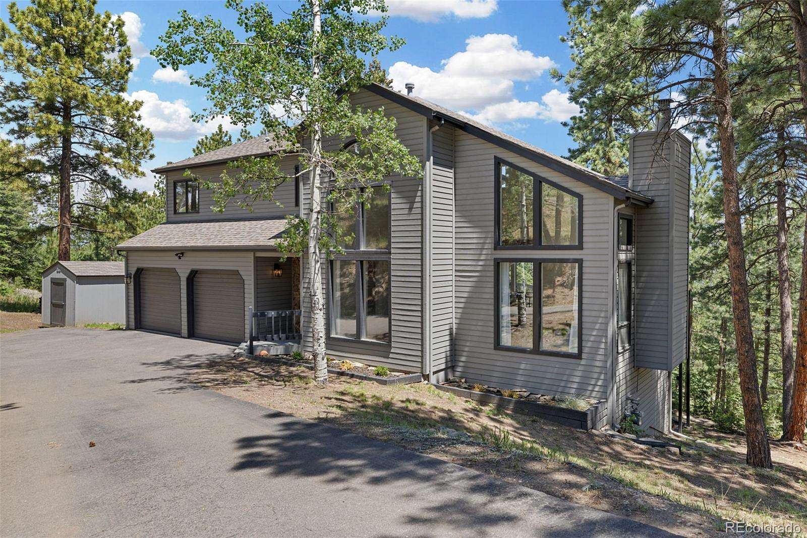 1.5 Acres of Land with Home for Sale in Evergreen, Colorado
