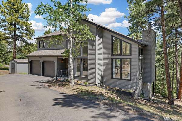 1.5 Acres of Land with Home for Sale in Evergreen, Colorado