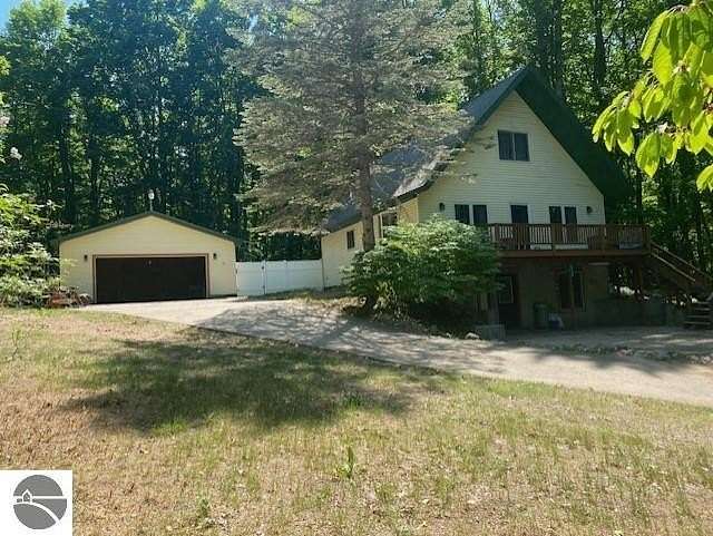 1.69 Acres of Land with Home for Sale in Bellaire, Michigan