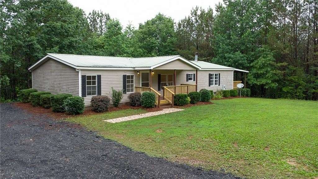 6.49 Acres of Land with Home for Sale in Dawsonville, Georgia