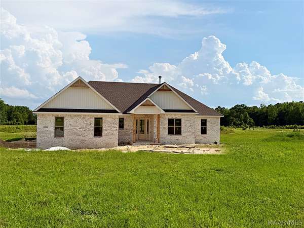 10.8 Acres of Land with Home for Sale in Eclectic, Alabama