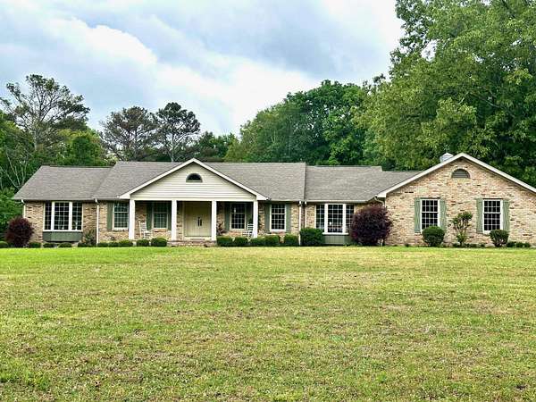47.8 Acres of Recreational Land with Home for Sale in Russellville, Alabama