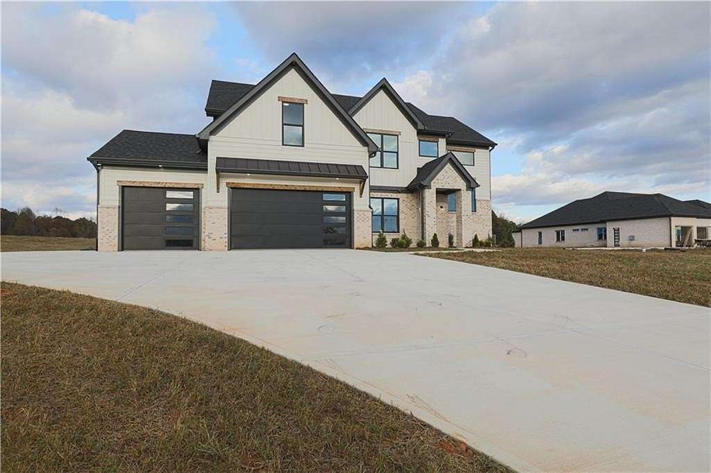 1.5 Acres of Land with Home for Sale in Maysville, Georgia