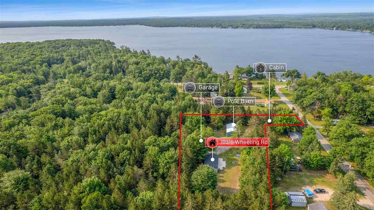 2.12 Acres of Land with Home for Sale in Carp Lake, Michigan