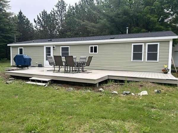 2.12 Acres of Land with Home for Sale in Carp Lake, Michigan