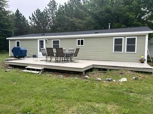 2.12 Acres of Land with Home for Sale in Carp Lake, Michigan