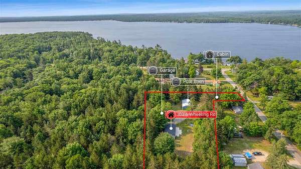 2.12 Acres of Land with Home for Sale in Carp Lake, Michigan