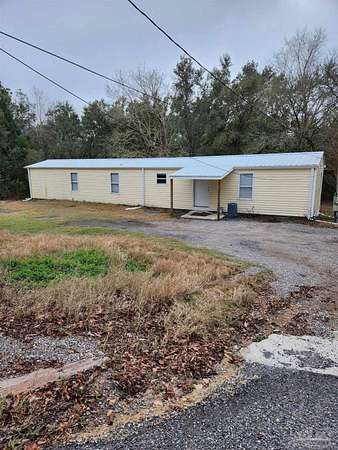 5.1 Acres of Improved Mixed-Use Land for Sale in Milton, Florida