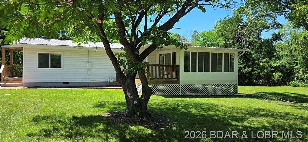 1.5 Acres of Land with Home for Sale in Gravois Mills, Missouri