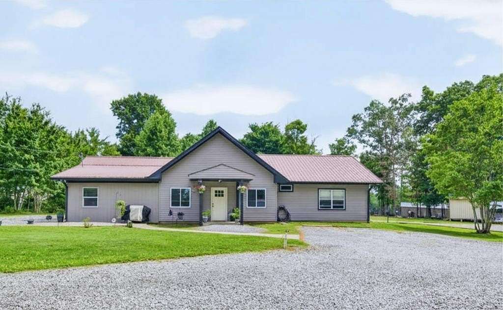 10.5 Acres of Land with Home for Sale in Monterey, Tennessee