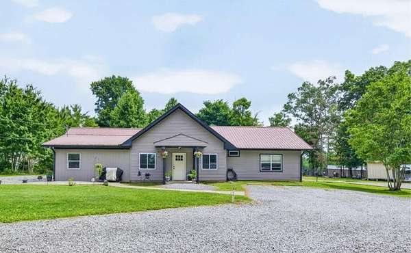 10.5 Acres of Land with Home for Sale in Monterey, Tennessee