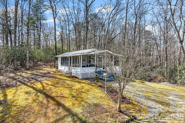 1 Acre of Land with Home for Sale in Balsam Grove, North Carolina