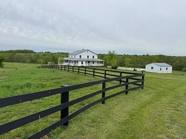 31.3 Acres of Agricultural Land with Home for Sale in Downing, Missouri