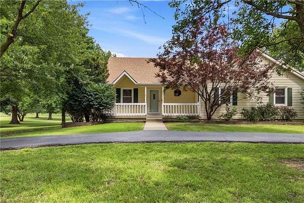 3.34 Acres of Land with Home for Sale in Peculiar, Missouri