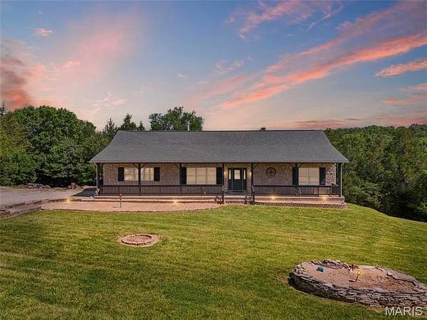 5.54 Acres of Land with Home for Sale in De Soto, Missouri