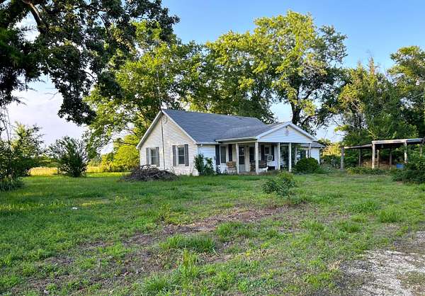 83 Acres of Land with Home for Sale in Jerico Springs, Missouri