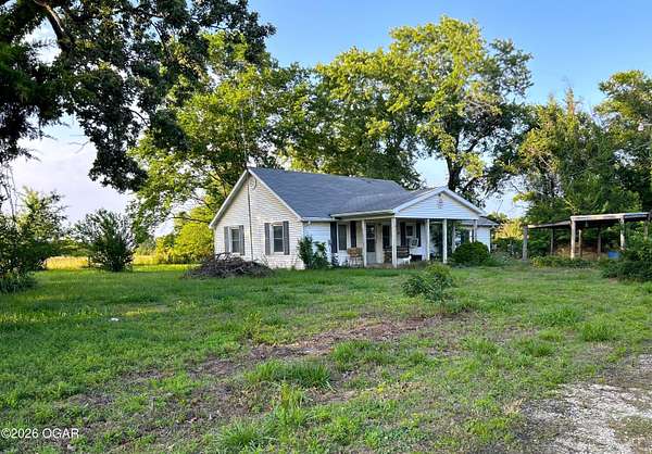 83 Acres of Land with Home for Sale in Jerico Springs, Missouri