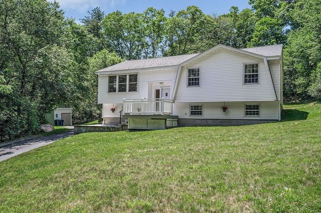 1.8 Acres of Land with Home for Sale in Dracut, Massachusetts